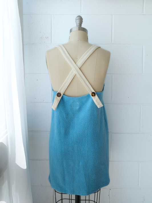 Blue dress with beige adjustable straps on a mannequin handmade recycled 100% cotton blankets one of a kind byron bay sustainable fashion 