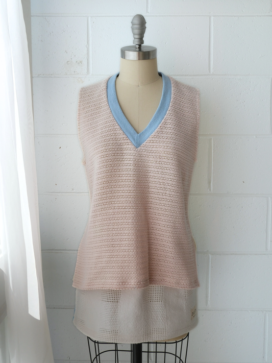 Peach pink knitted v neck vest with blue contrast bind 100% cotton recycled blankets handmade made in australia upcycled byron bay sustainable fashion 